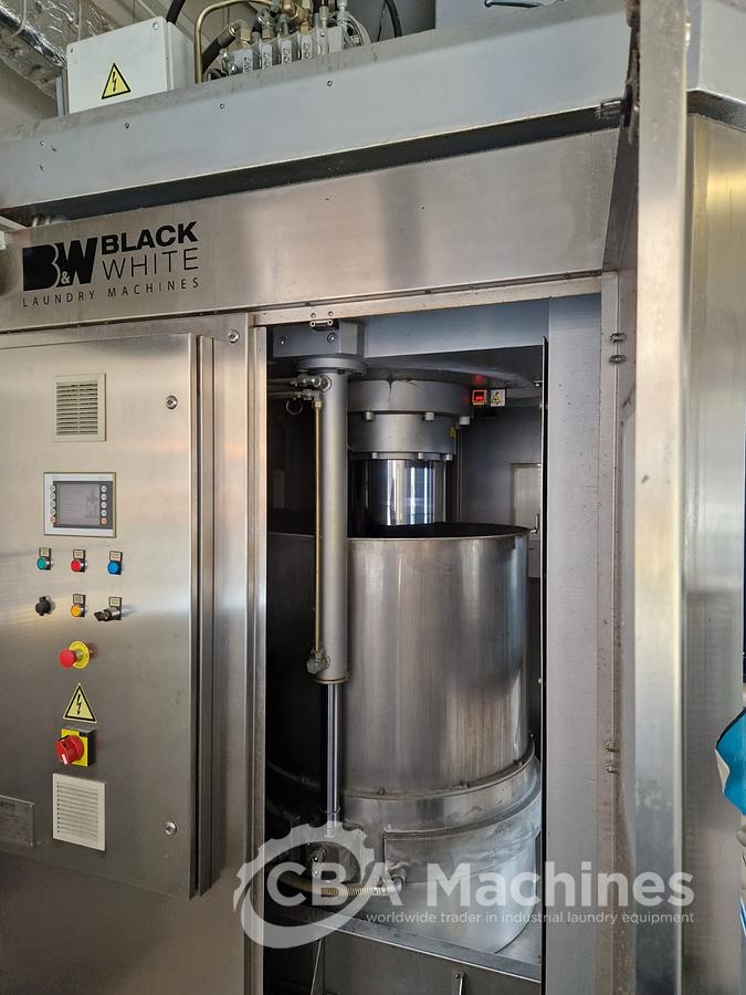 Used Complete 2010 Black & White 13x50kg (Transferon) tunnel system with Press + Shuttle + 2 Gas Dryers + 1 Shaker + Loading Conveyor