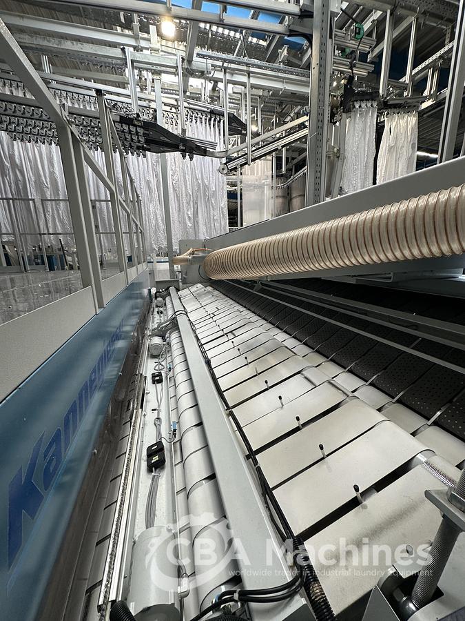 Used 2023 Kannegiesser Ironing Line EMA 40-01+2-2/4-1/2 (1053) + HPM-II 3 x 1200 x 4000mm (1054) + SFM-E 40(42)-1/2-3-KR3-R-ISP6 (1055)