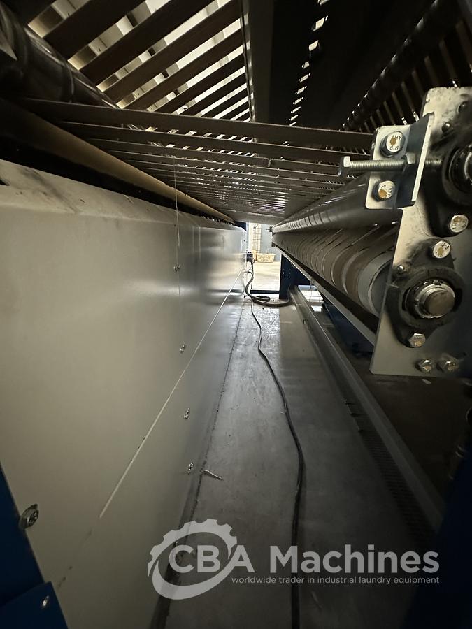 Used 2013 Lapauw small piece ironing line with vacuum table 1 roll 1600 Gas ironer and unifold 