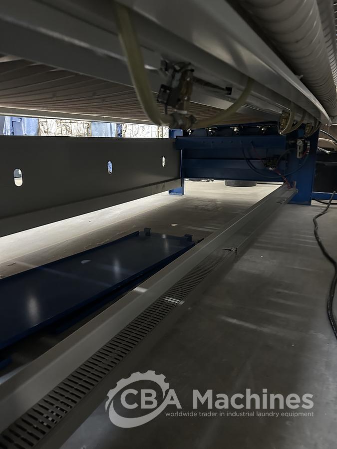 Used 2013 Lapauw small piece ironing line with vacuum table 1 roll 1600 Gas ironer and unifold 