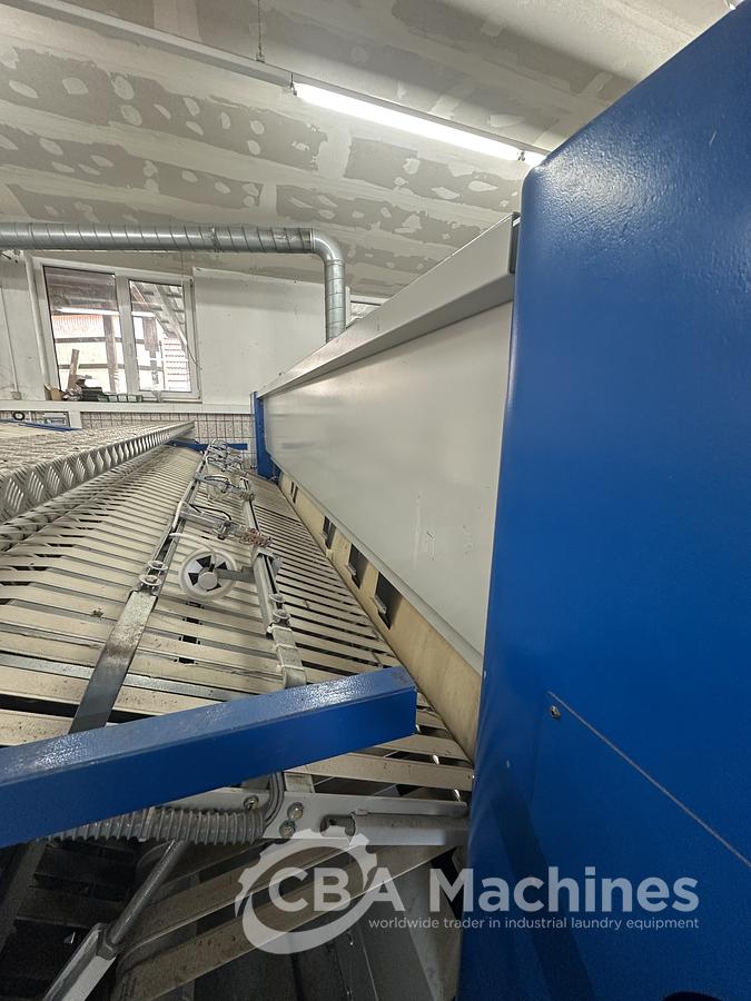 Used 2013 Lapauw small piece ironing line with vacuum table 1 roll 1600 Gas ironer and unifold 