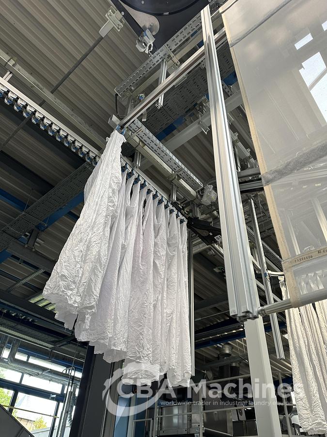 Used 2023 Kannegiesser Ironing Line GZ-A 01+2 + EMA 40-01+2-2/4-1/2 + HPM-II 3 roll x 1200 x 4000mm + SFM-E 40(42)-1/2-3-KR3-R-ISP6 (1053-1054-1055-1056)