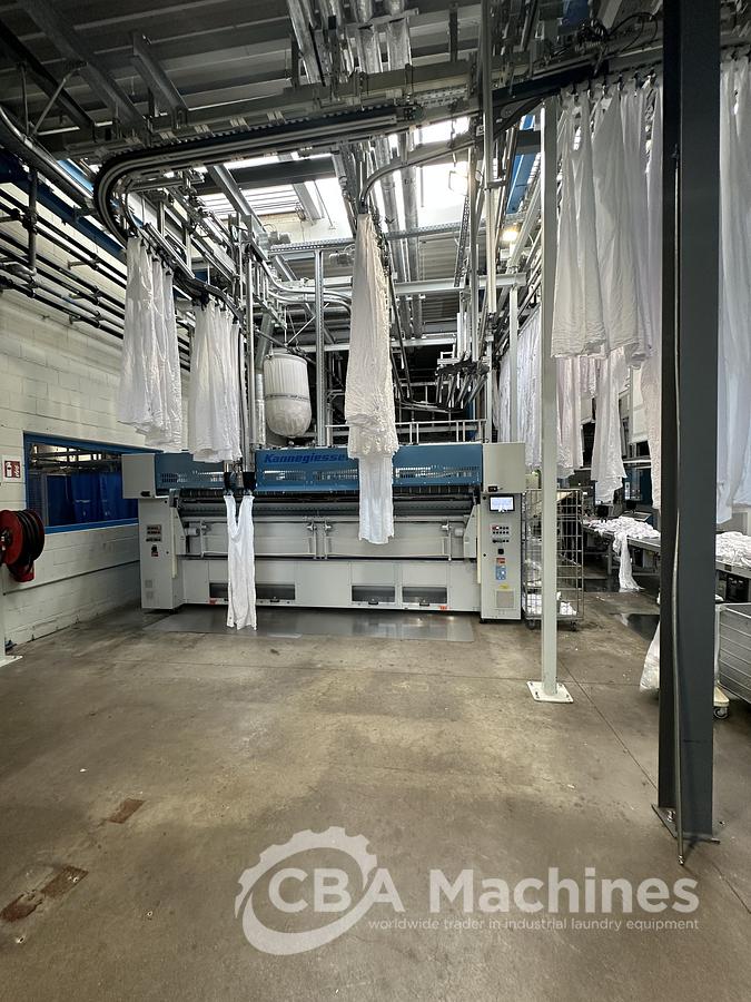 Used 2023 Kannegiesser Ironing Line EMA 40-01+2-2/4-1/2 (1053) + HPM-II 3 x 1200 x 4000mm (1054) + SFM-E 40(42)-1/2-3-KR3-R-ISP6 (1055)