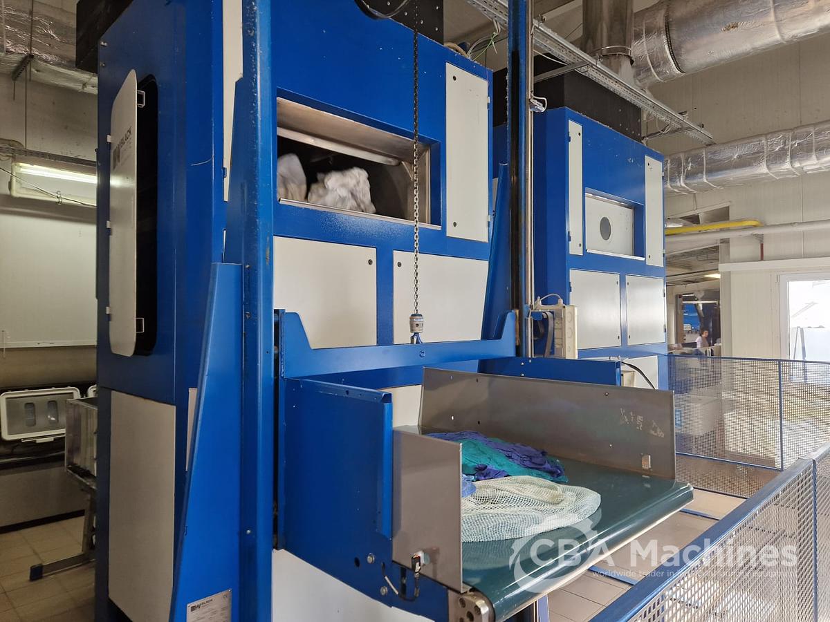 Used Complete 2010 Black & White 13x50kg (Transferon) tunnel system with Press + Shuttle + 2 Gas Dryers + 1 Shaker + Loading Conveyor