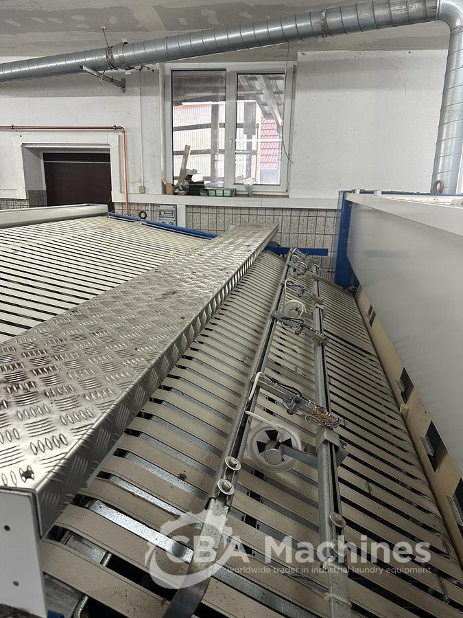 Used 2013 Lapauw small piece ironing line with vacuum table 1 roll 1600 Gas ironer and unifold 