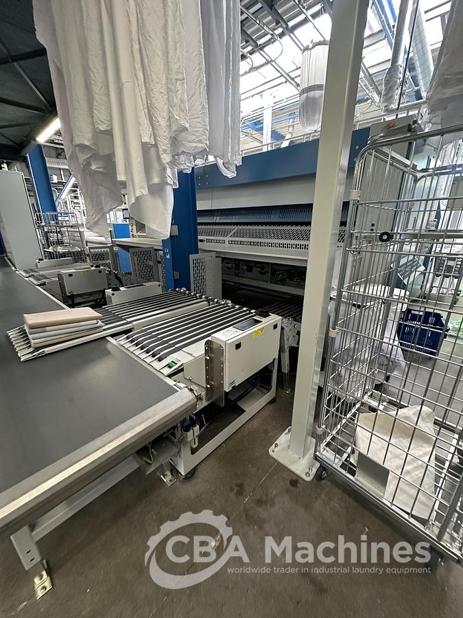 Used 2023 Kannegiesser Ironing line EMQ synchro pro 40-01+2-4/4-1/2 (1033) + HighPower HPM 3x1200x4000mm (1034) + SFM-E 40(42)-1/2-3-KR3-R-ISP4 (1035)
