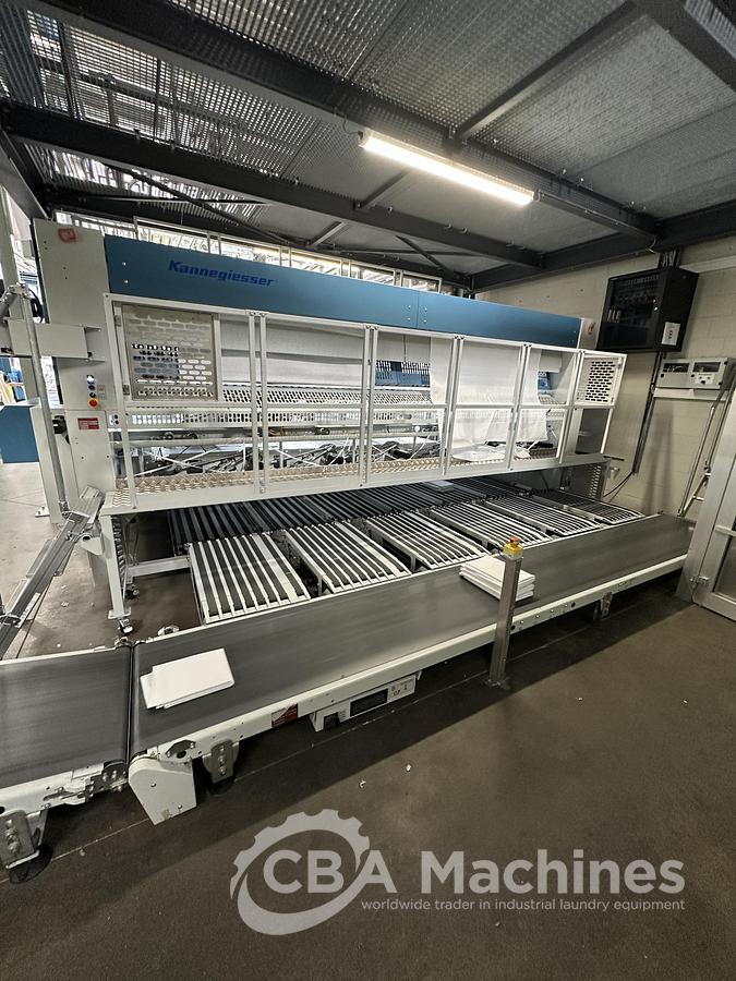 Used 2023 Kannegiesser Ironing Line EMA 40-01+2-2/4-1/2 (1053) + HPM-II 3 x 1200 x 4000mm (1054) + SFM-E 40(42)-1/2-3-KR3-R-ISP6 (1055)