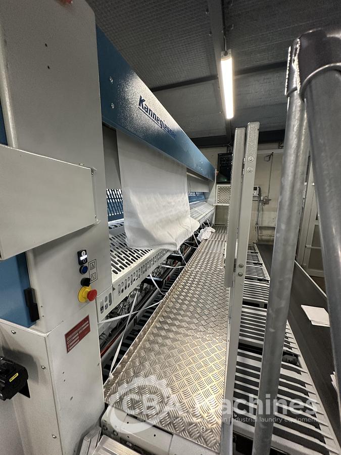 Used 2023 Kannegiesser Ironing Line EMA 40-01+2-2/4-1/2 (1053) + HPM-II 3 x 1200 x 4000mm (1054) + SFM-E 40(42)-1/2-3-KR3-R-ISP6 (1055)