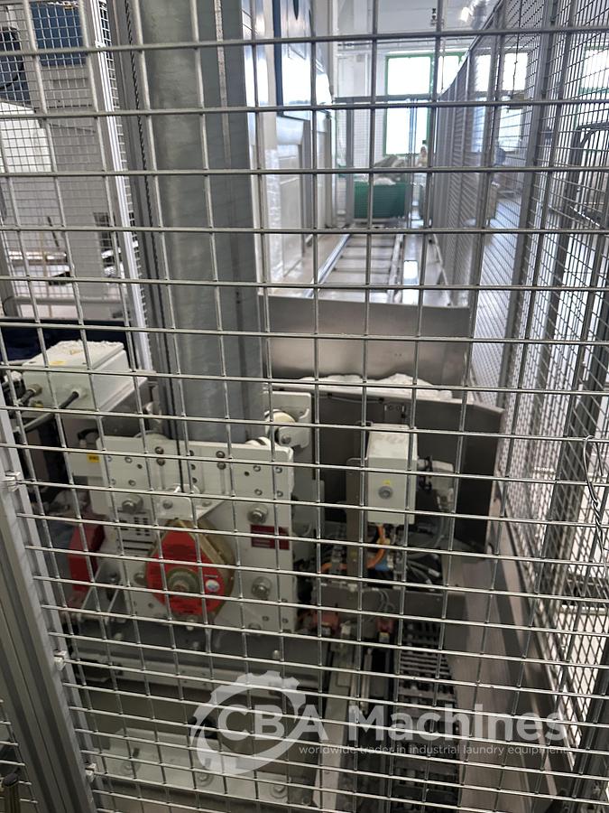 Used 2020 Kannegiesser Complete CBW Tunnel System PT 13x60 + Press PP10-60-40 + Shuttle + 3x DII-60 GAS + Step Conveyor + Lint Filter + Conveyors