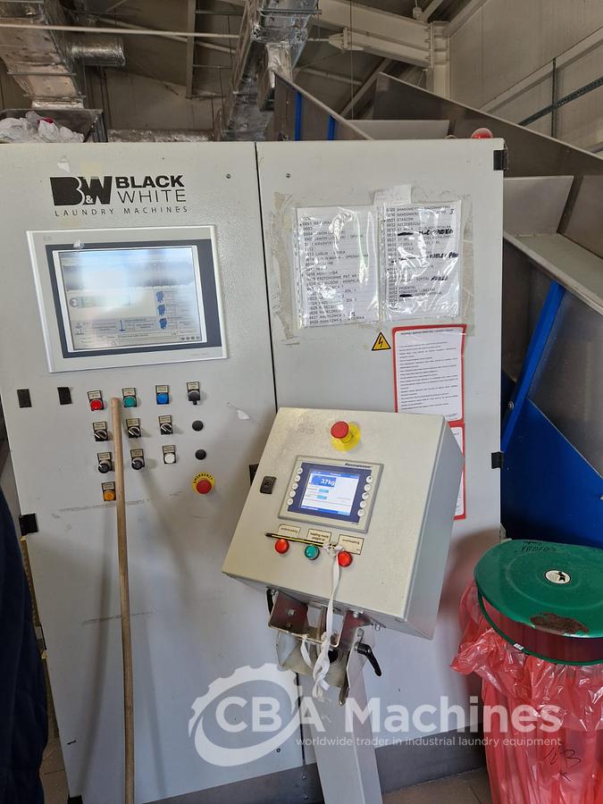 Used Complete 2010 Black & White 13x50kg (Transferon) tunnel system with Press + Shuttle + 2 Gas Dryers + 1 Shaker + Loading Conveyor