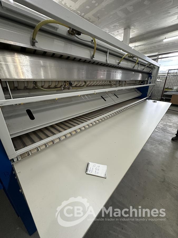 Used 2013 Lapauw small piece ironing line with vacuum table 1 roll 1600 Gas ironer and unifold 