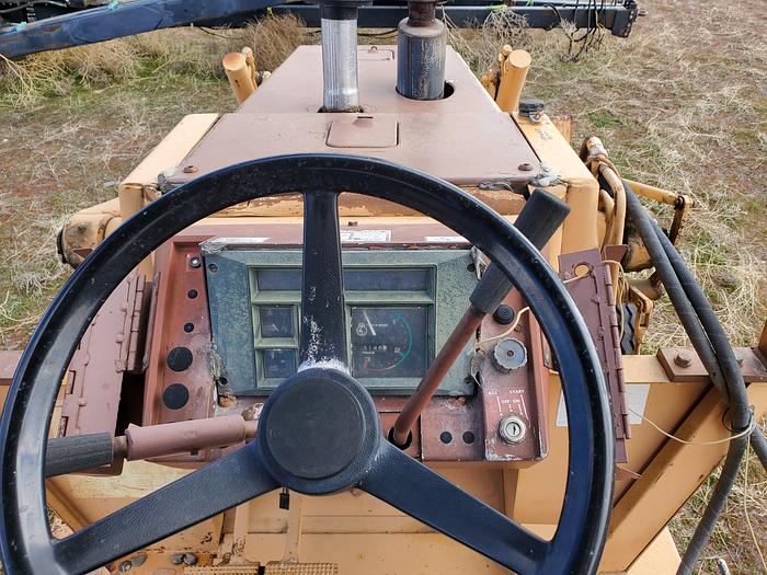 Used Case 580SE Backhoe w/ Attachments