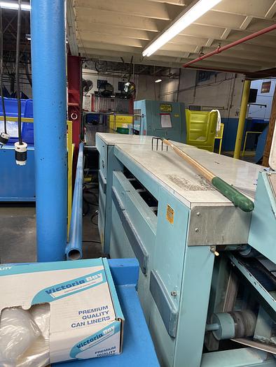 Used 2002 Braun rear discharge small piece folder