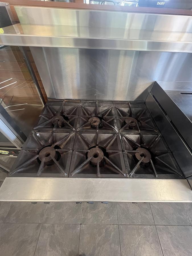 Used Commercial 6 Burner Range with 24" Griddle & Dual Standard Ovens – Natural Gas – Stainless Steel