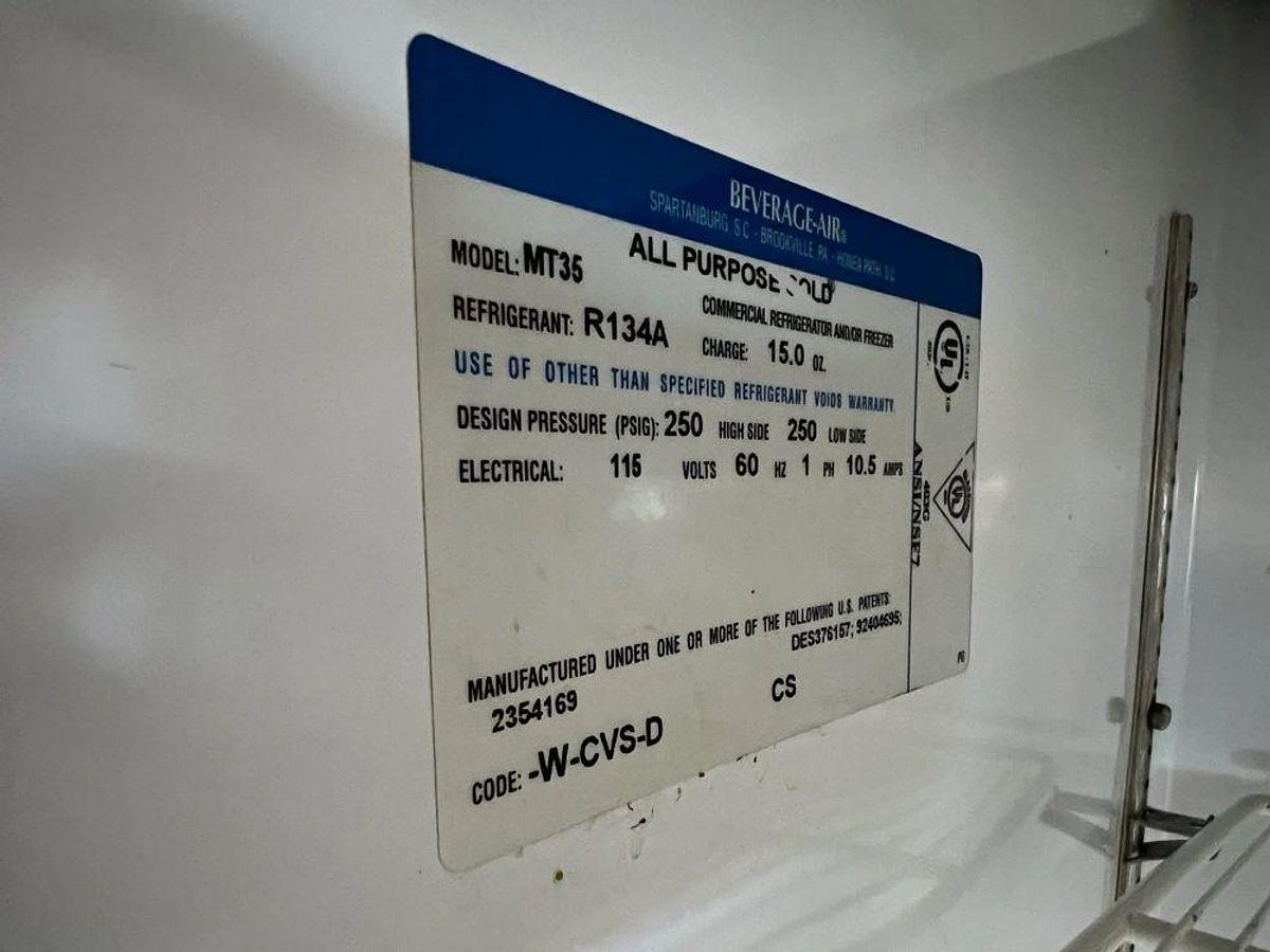 Used Beverage-Air MT-35 White Two Section Glass Door Merchandiser RefrigeratorBeverage-Air MT-35 White Two Section Glass Door Merchandiser Refrigerator