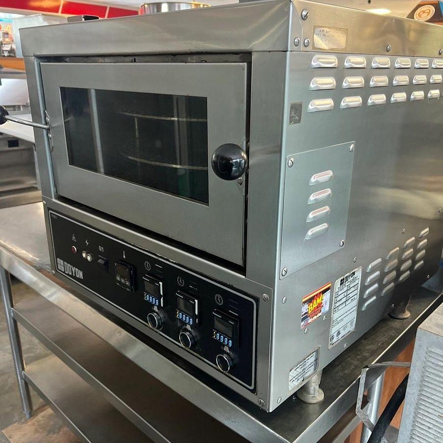 Used Doyon Model FPR3 - 3 Rotating Deck Pizza Oven - 208V 1 PhaseDoyon Model FPR3 - 3 Rotating Deck Pizza Oven - 208V 1 Phase