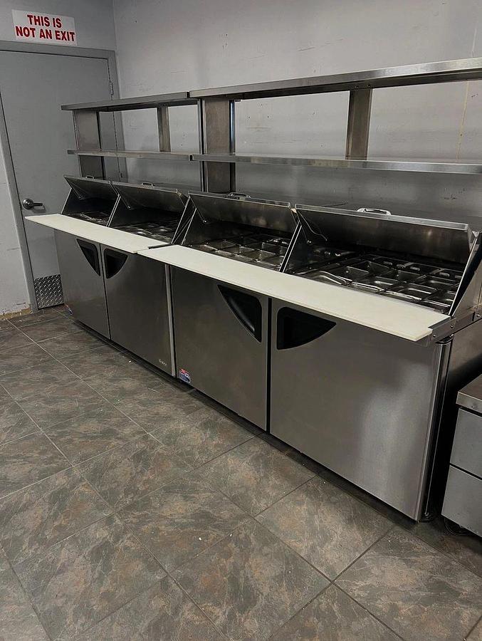 Used Turbo Air TST-60SD-24-N 60 1/4” Super Deluxe Mega Top Sandwich/Salad Prep Table w/ Refrigerated Base, 115vTurbo Air TST-60SD-24-N 60 1/4” Super Deluxe Mega Top Sandwich/Salad Prep Table w/ Refrigerated Base, 115v