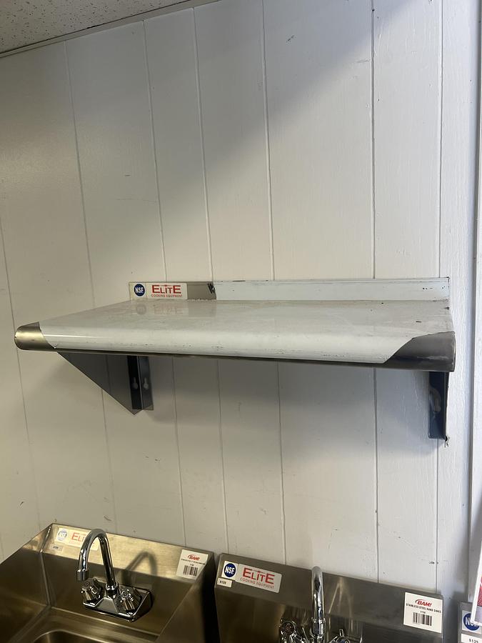 Used Elite 12" x 24" Stainless Steel Wall Shelf with 1 1/2" Backsplash – NSF Commercial Shelf