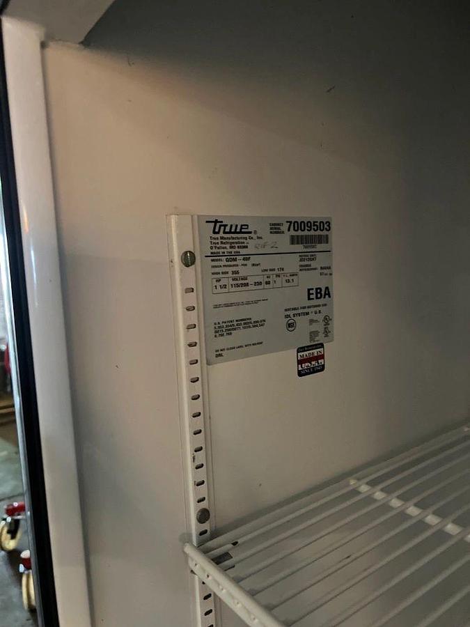 Used True GDM-49F Two Section Display Freezer w/ Right Hinged Swing Doors - Bottom Mount Compressor, BlackTrue GDM-49F Two Section Display Freezer w/ Right Hinged Swing Doors - Bottom Mount Compressor, Black
