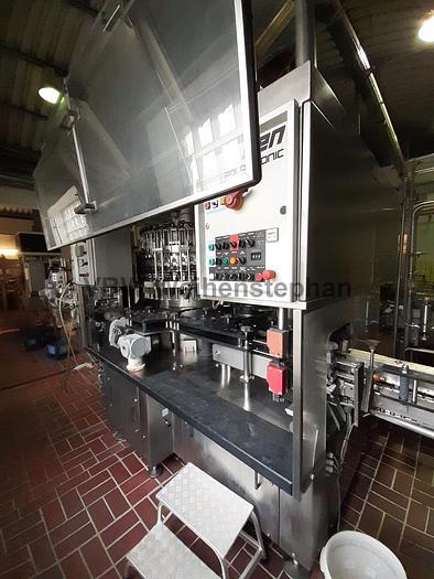 Used glass bottle filler and capper