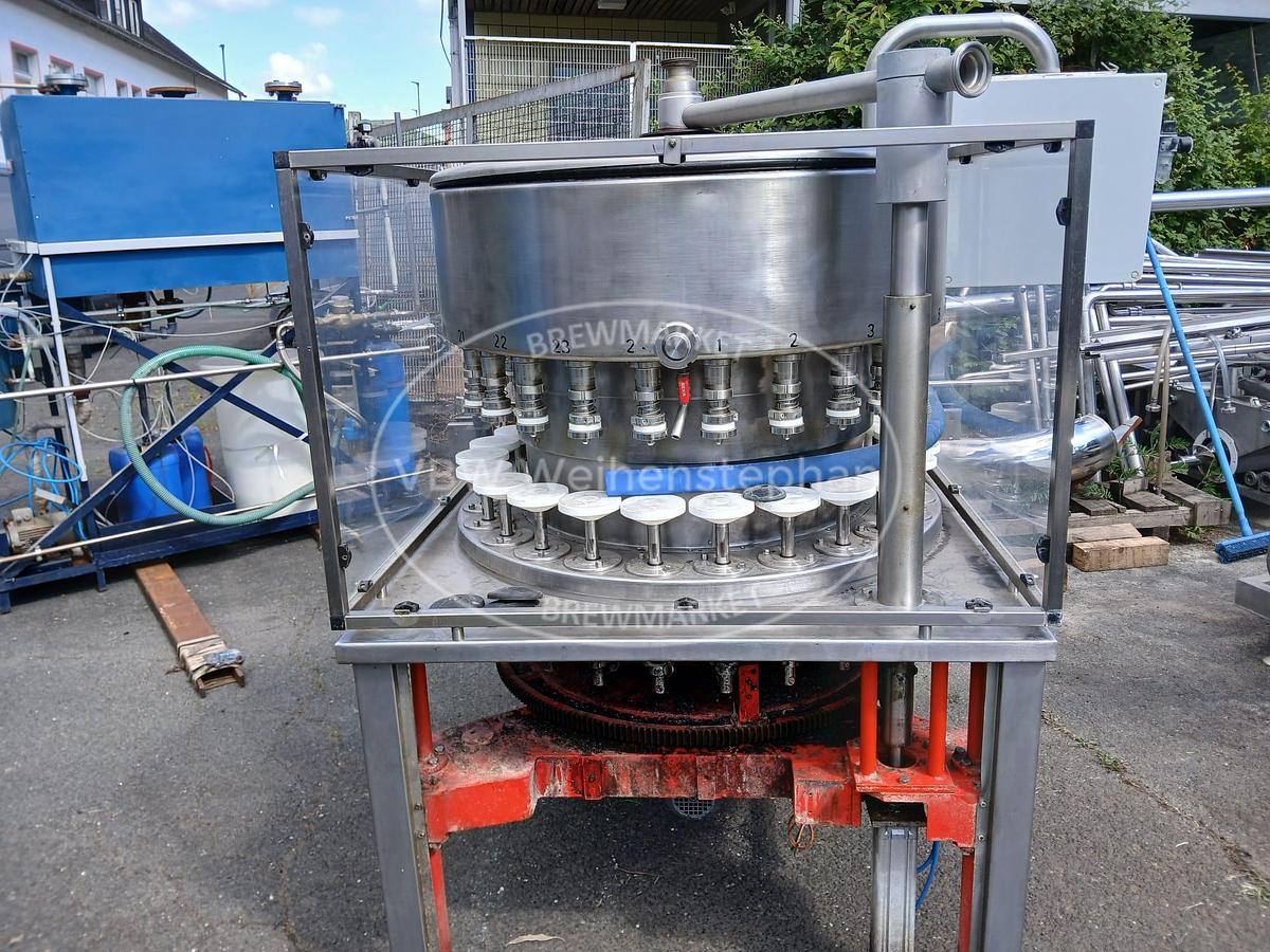 Used glass bottle vacuum filler