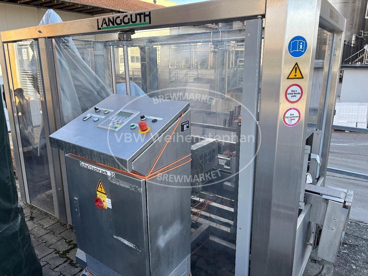 Used Filling, sealing and labelling machine for plastic buckets; manufactured between