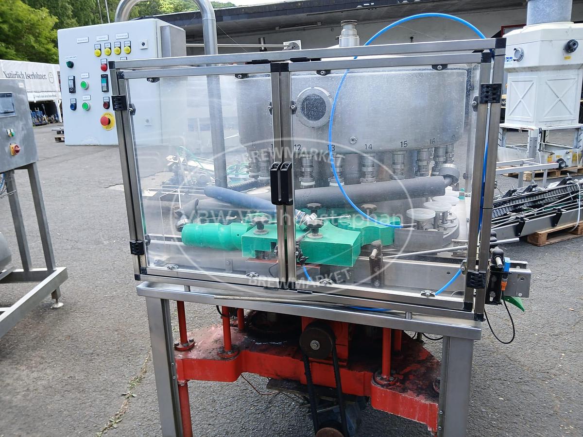 Used glass bottle vacuum filler
