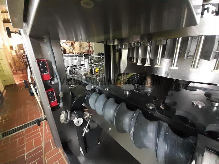 Used glass bottle filler and capper