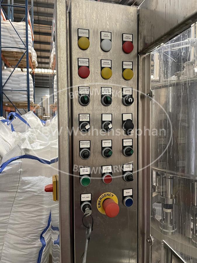 Used glass bottle filler and capper