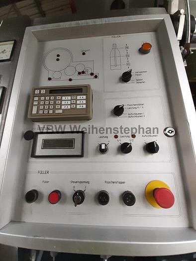 Used glass bottle filler and capper