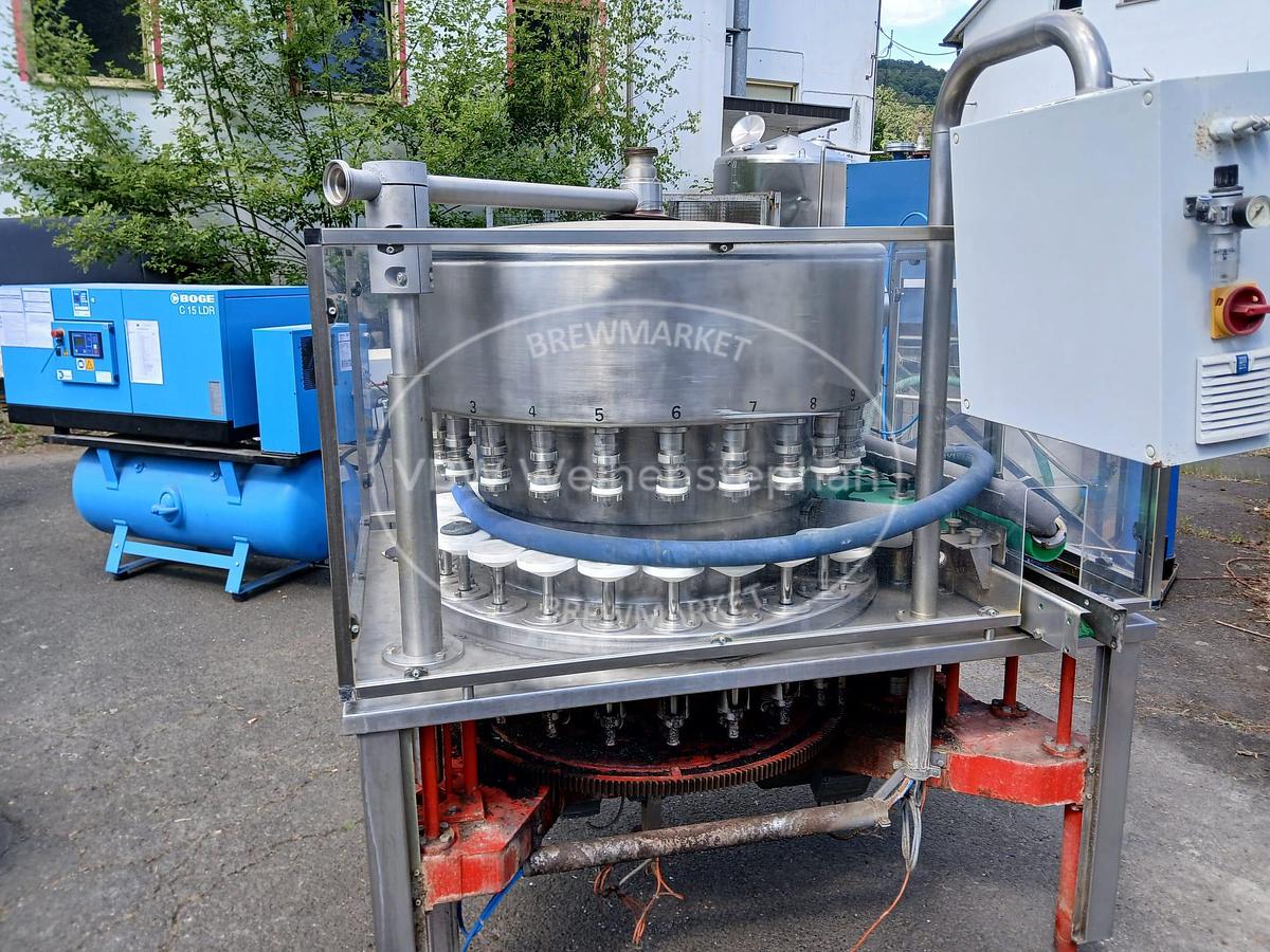 Used glass bottle vacuum filler