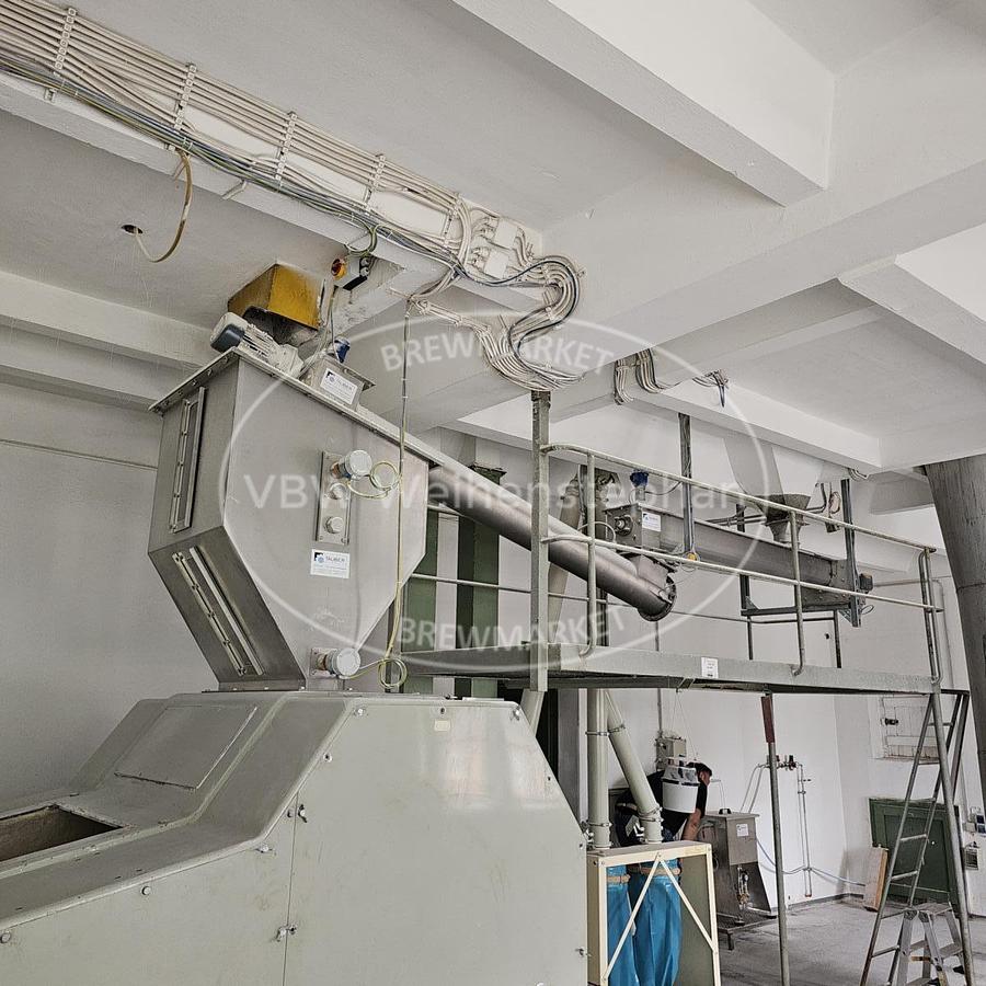 Used Six-roll crushing mill, including feed screw with conditioning