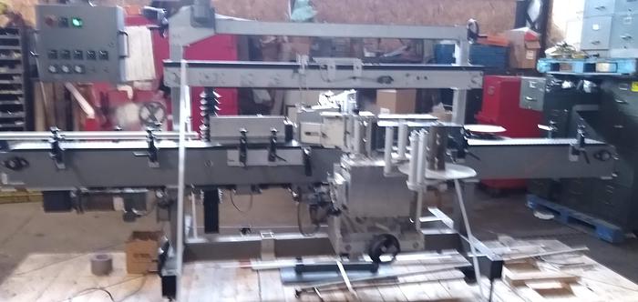 Usado Universal SL-1000 Contract Packager Front Back and wrap labeler