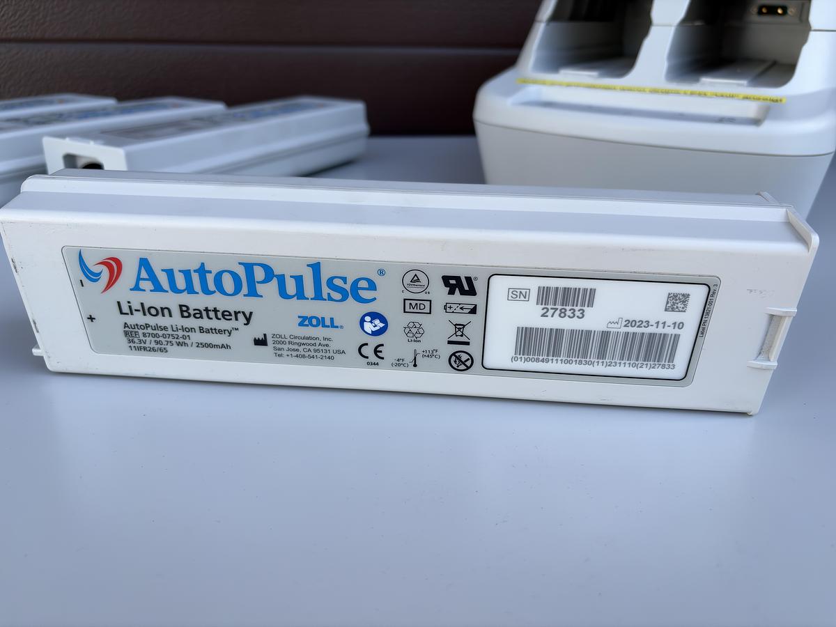 Used ZOLL AutoPulse Model 100 Resuscitation System with Charger, 4 Batteries and Accessories