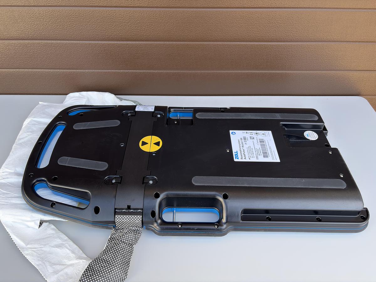 Used ZOLL AutoPulse Model 100 Resuscitation System with Charger, 4 Batteries and Accessories