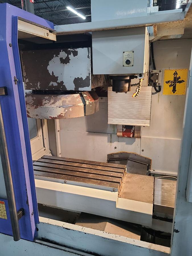 Used SHARP VERTICAL MACHINING CENTER