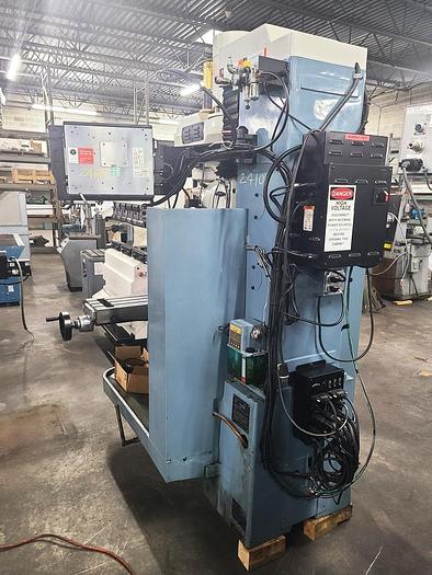 Used SWI PROTO TRAK CNC VERTICAL BED MILL