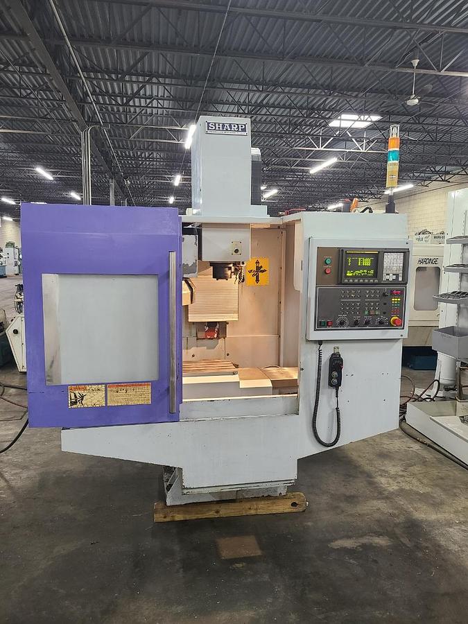 Used SHARP VERTICAL MACHINING CENTER