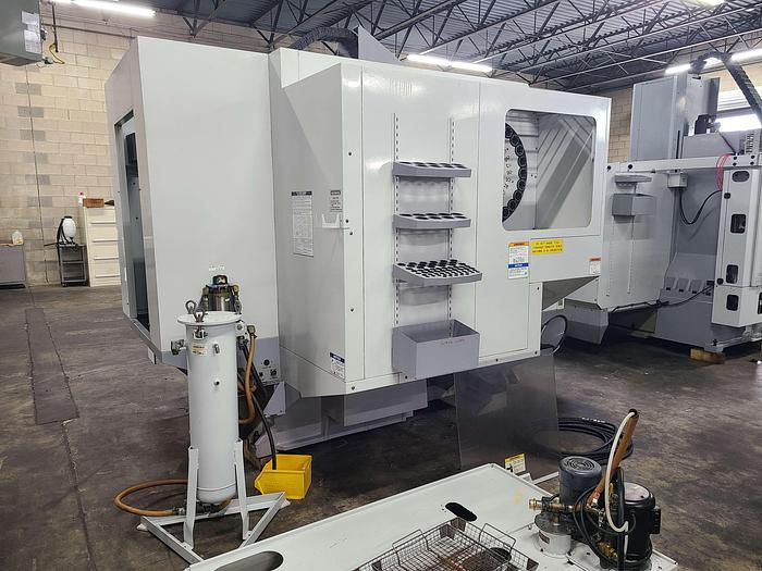 Used HAAS DUAL PALLET VERTICAL MACHINING CENTER