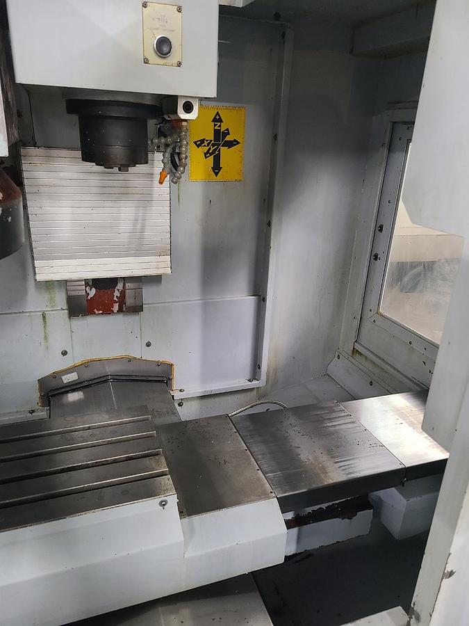 Used SHARP VERTICAL MACHINING CENTER