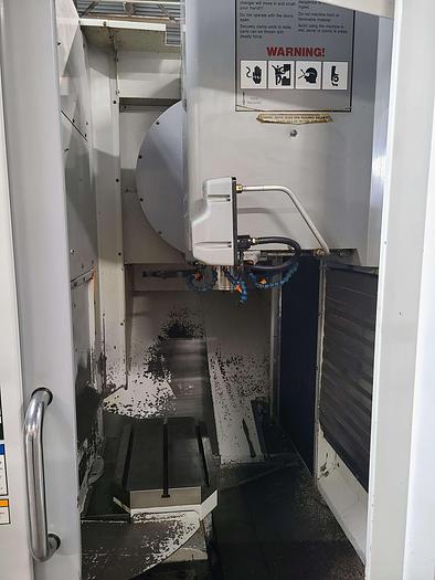 Used HAAS DUAL PALLET VERTICAL MACHINING CENTER