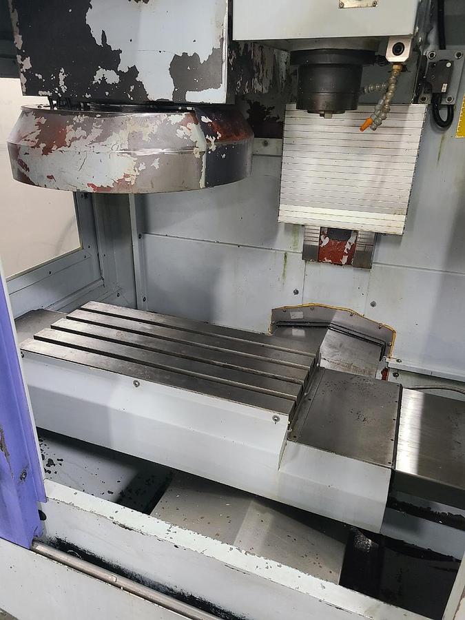 Used SHARP VERTICAL MACHINING CENTER