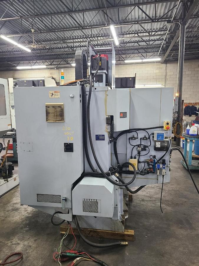 Used SHARP VERTICAL MACHINING CENTER