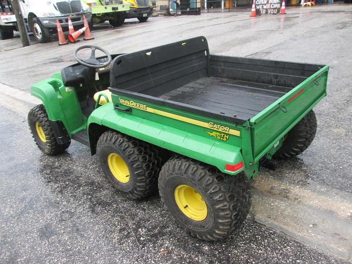 Used John Deere Gator TH 6x4, 6 Wheel With Dump Bed