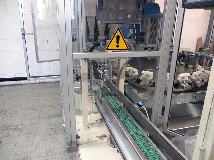 Used Senzani Flip Top Cartonner for candy