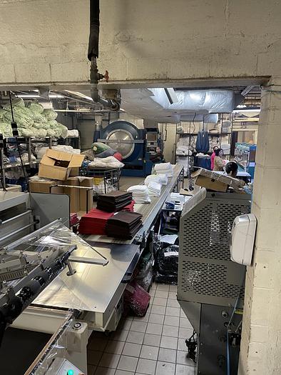 Used Felins Shrinktech L-Sealer with conveyors