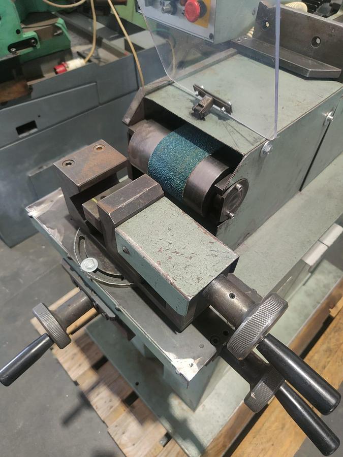 Used 1998 ACETI SMASHER? Wait. It's 'SMERIGLIATRICE' means deburring machine or deburring grinder. 'ACETI' is company or steel? The phrase: "1998 SMERIGLIATRICE ACETI mod. ART 55" Likely: "1998 ACETI deburring machine model ART 55"