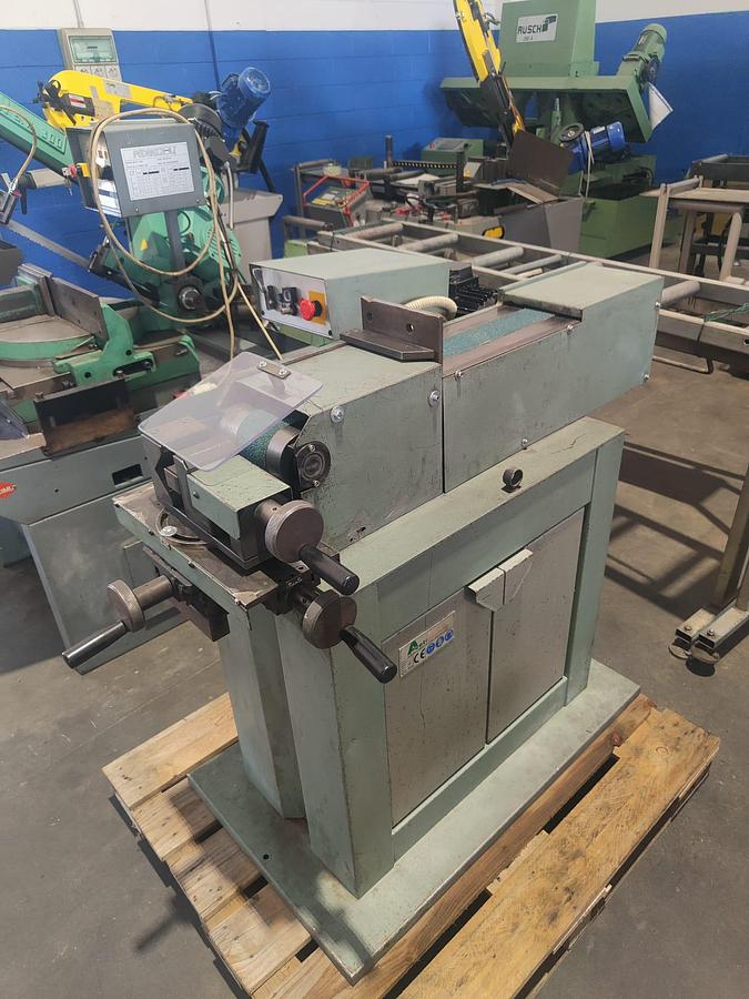 Used 1998 ACETI SMASHER? Wait. It's 'SMERIGLIATRICE' means deburring machine or deburring grinder. 'ACETI' is company or steel? The phrase: "1998 SMERIGLIATRICE ACETI mod. ART 55" Likely: "1998 ACETI deburring machine model ART 55"