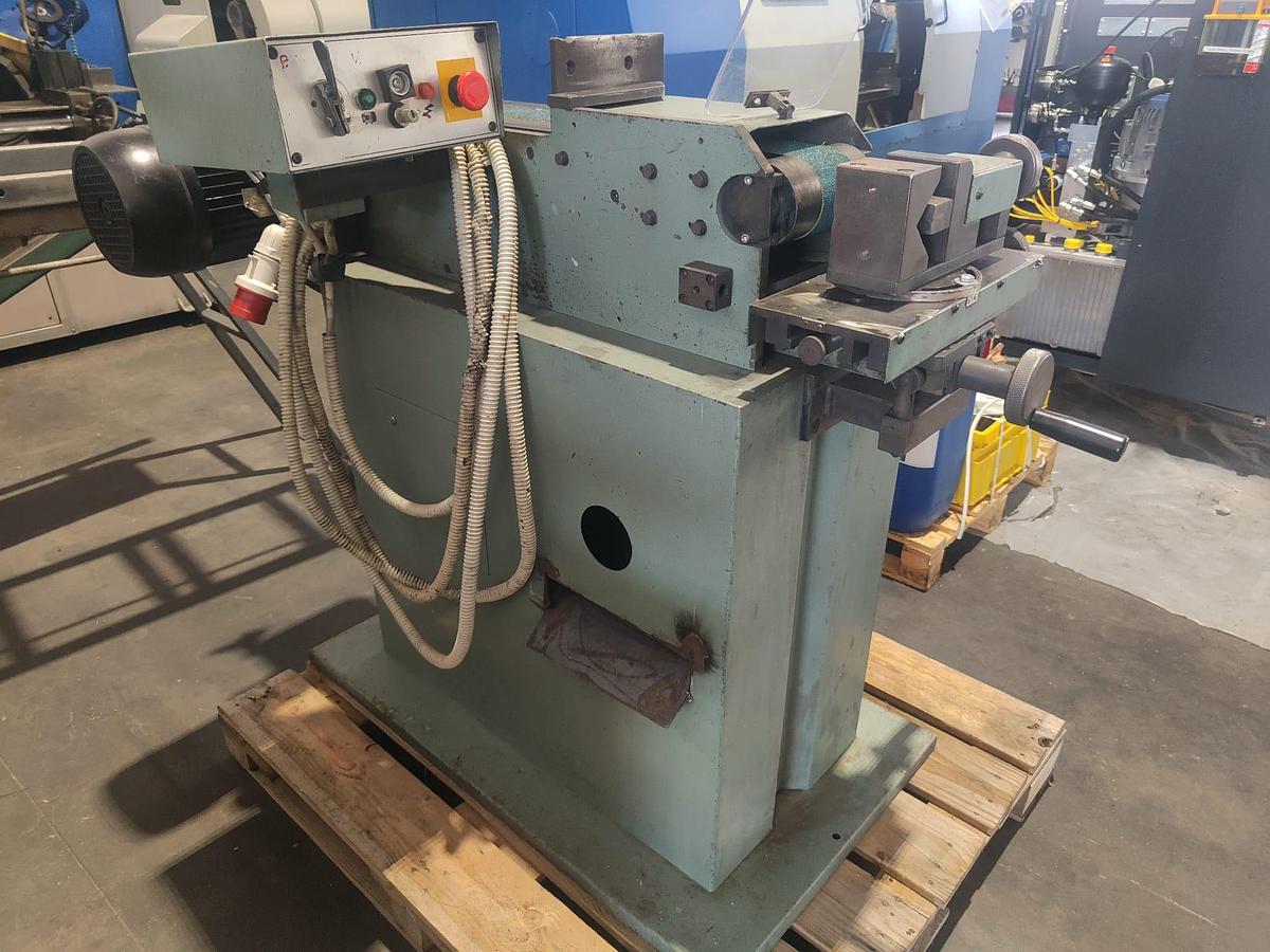 Used 1998 ACETI SMASHER? Wait. It's 'SMERIGLIATRICE' means deburring machine or deburring grinder. 'ACETI' is company or steel? The phrase: "1998 SMERIGLIATRICE ACETI mod. ART 55" Likely: "1998 ACETI deburring machine model ART 55"