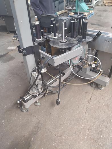 Used Labelaire pressure sensitive wrap labeler